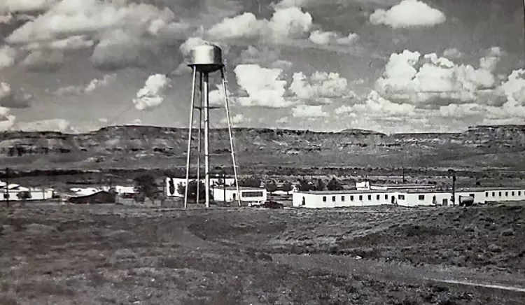 Black and white photo of a water tower.