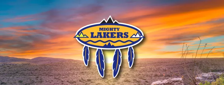 Lake Valley Navajo School logo over desert sunset.