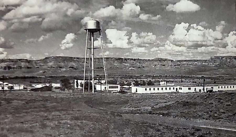 Black and white photo of a water tower.